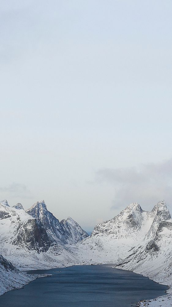 Winter iPhone wallpaper background, snowy mountain and ocean