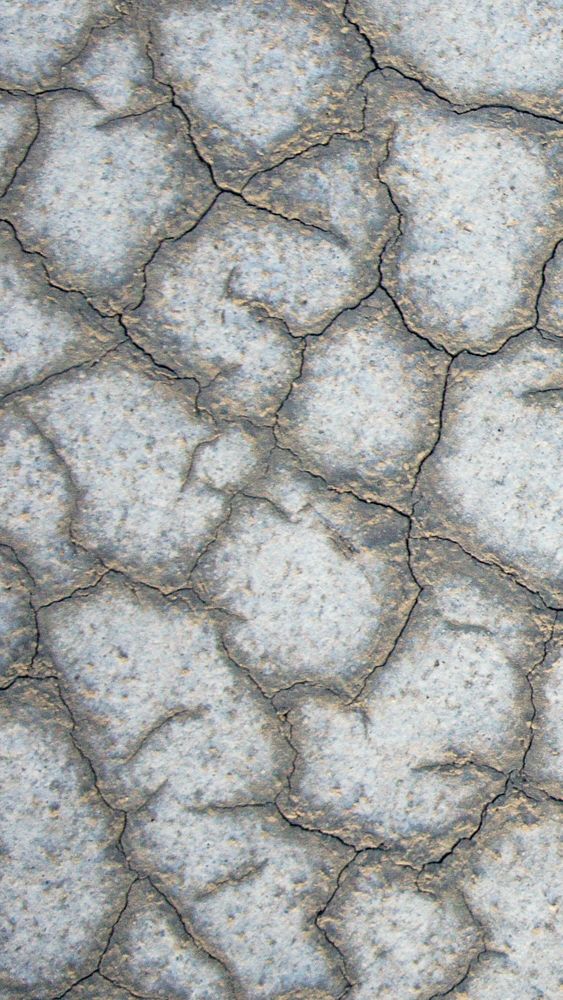 Cracked ground texture phone wallpaper, abstract background