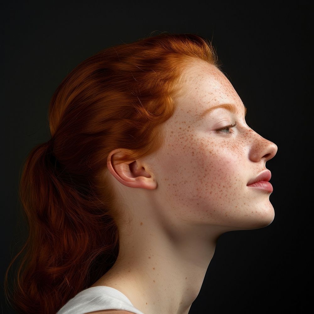 Freckles girl side portrait profile adult photo contemplation.