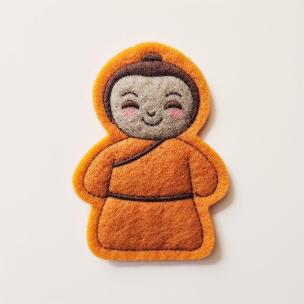 Felt stickers of a single buddha confectionery biscuit sweets.