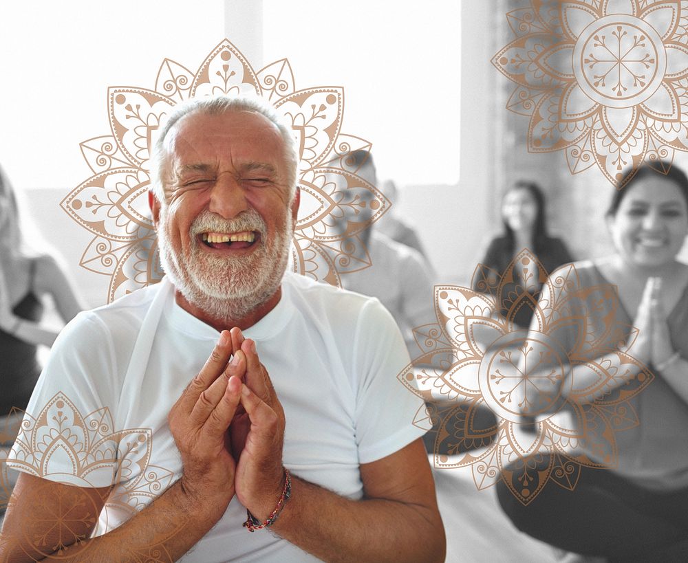 Smiling old man in yoga class