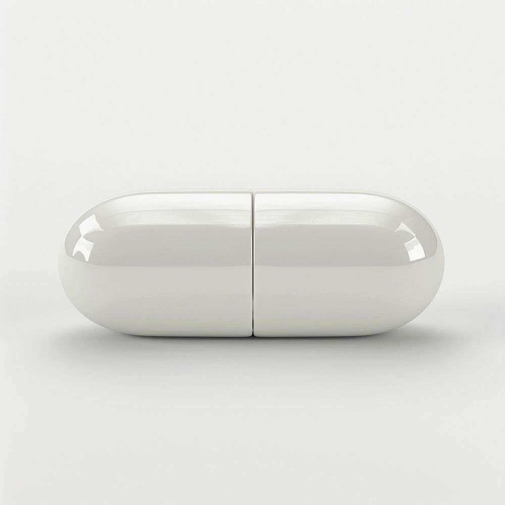 White oval pill electronics medication porcelain.
