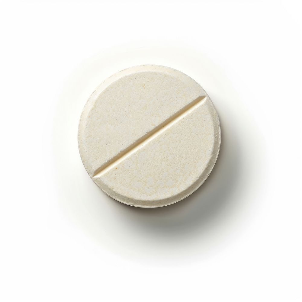 A single round medicine tablet medication pill.