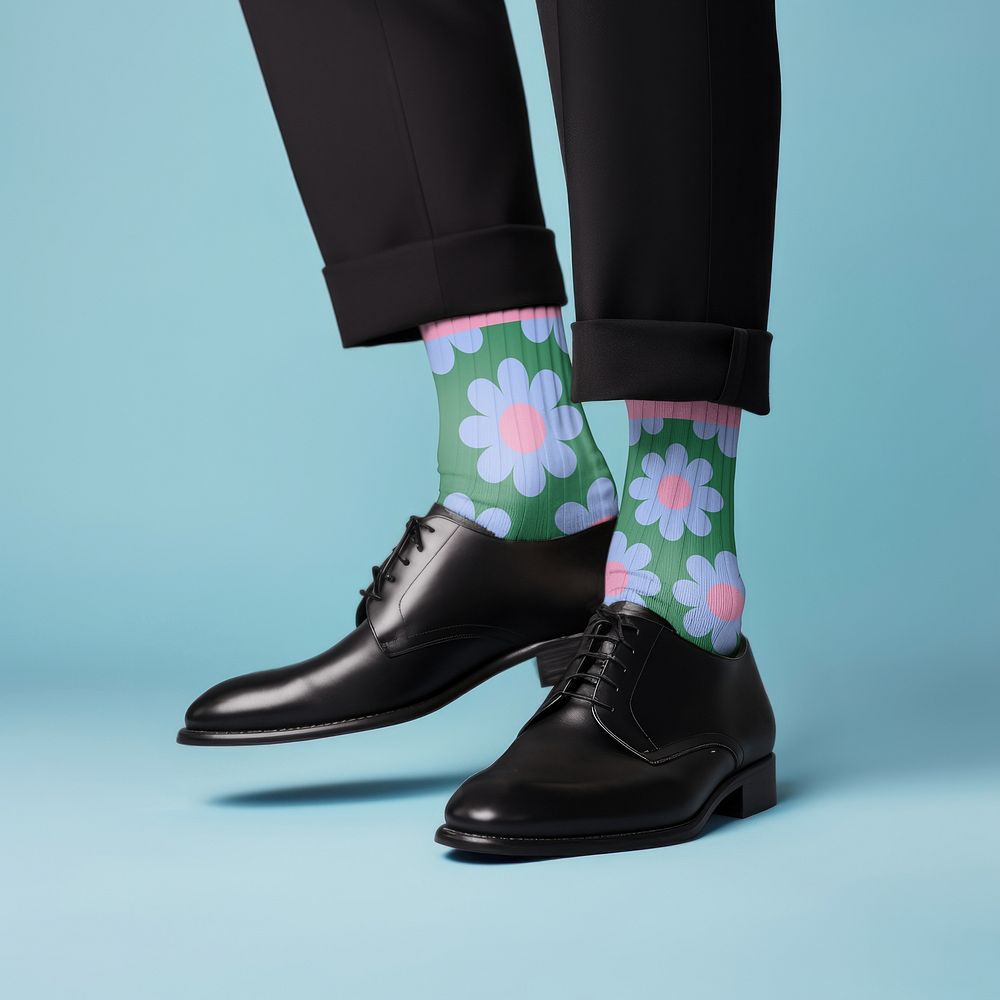 Man wearing blue floral mid calf socks