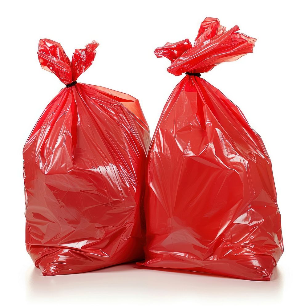 Red plastic garbage bags tied