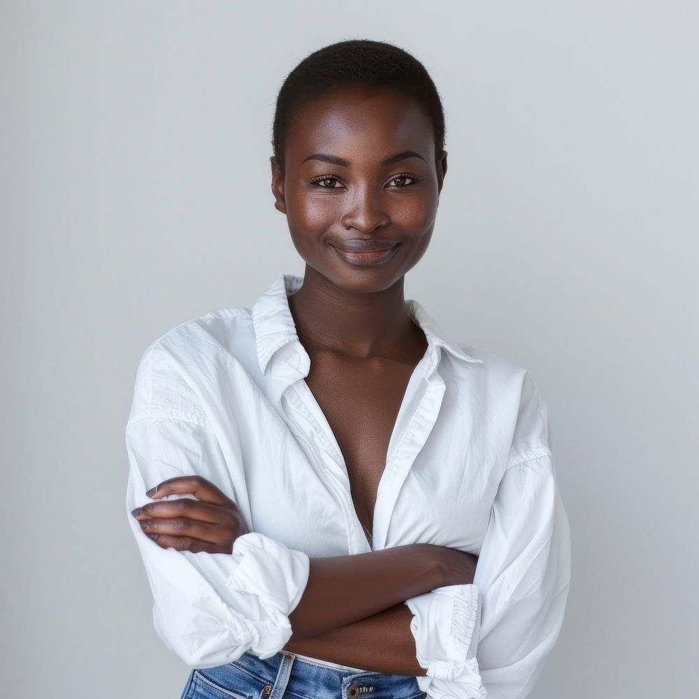 Confident woman in white shirt