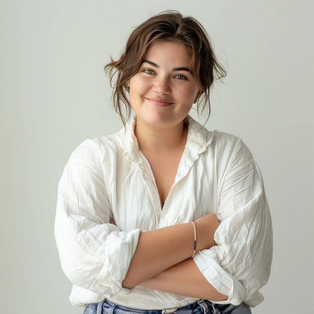 Confident woman in white shirt