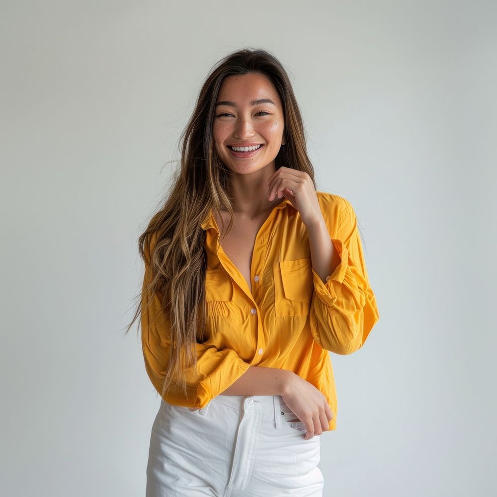 Smiling woman in yellow shirt