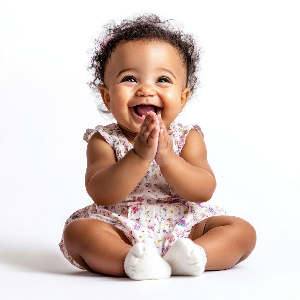 Baby girl sitting socks background.