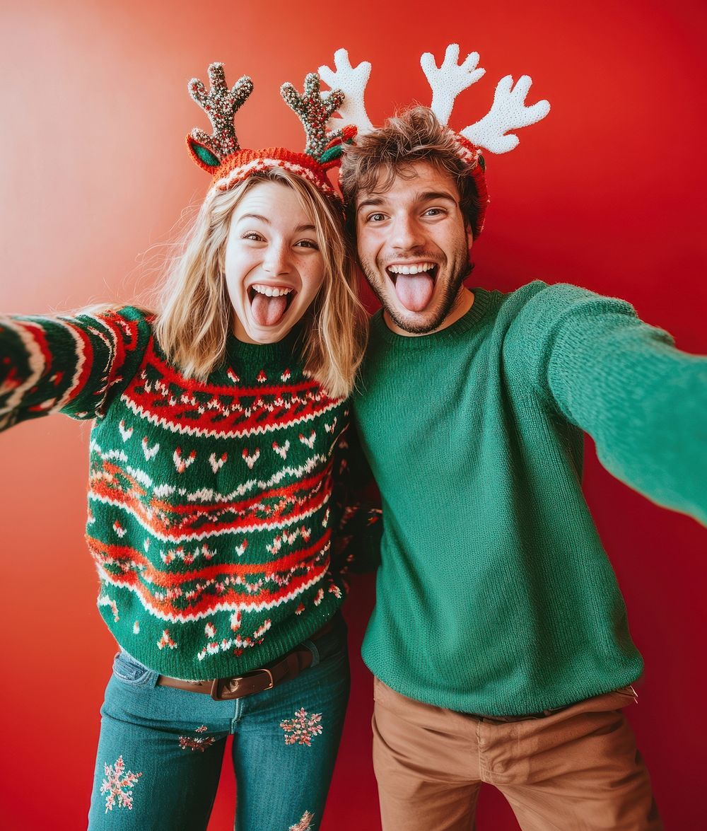 Selfie wearing christmas sweaters happy background laughing.