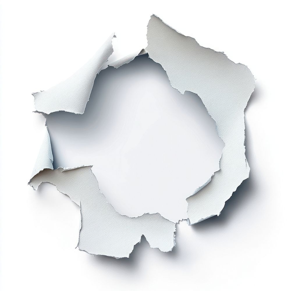 Ragged hole torn in ripped paper background white white background.