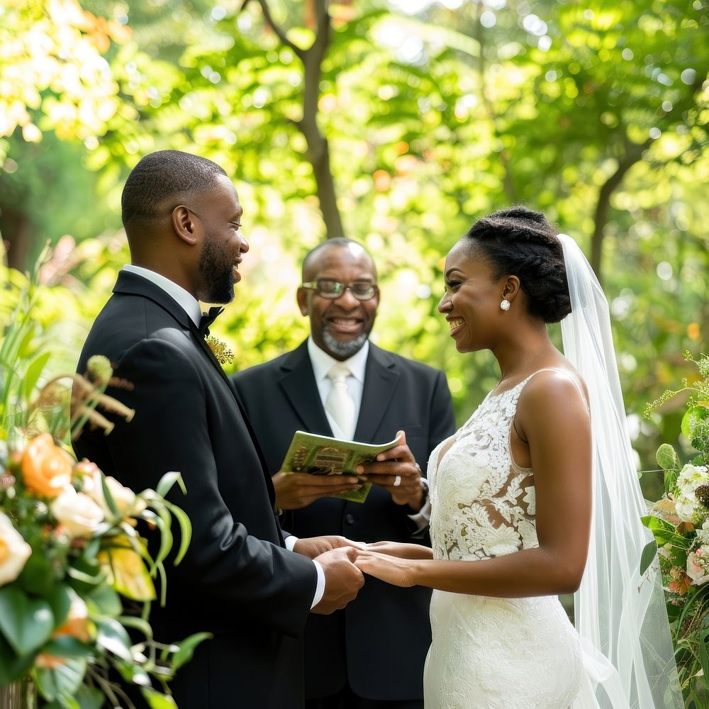 Black couple getting married wedding outdoors dress.