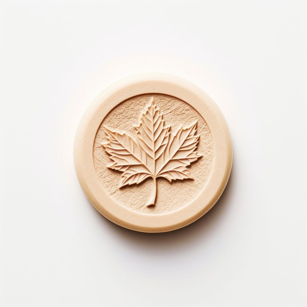 Wax Stamp maple leaf imprint white background cosmetics pattern.
