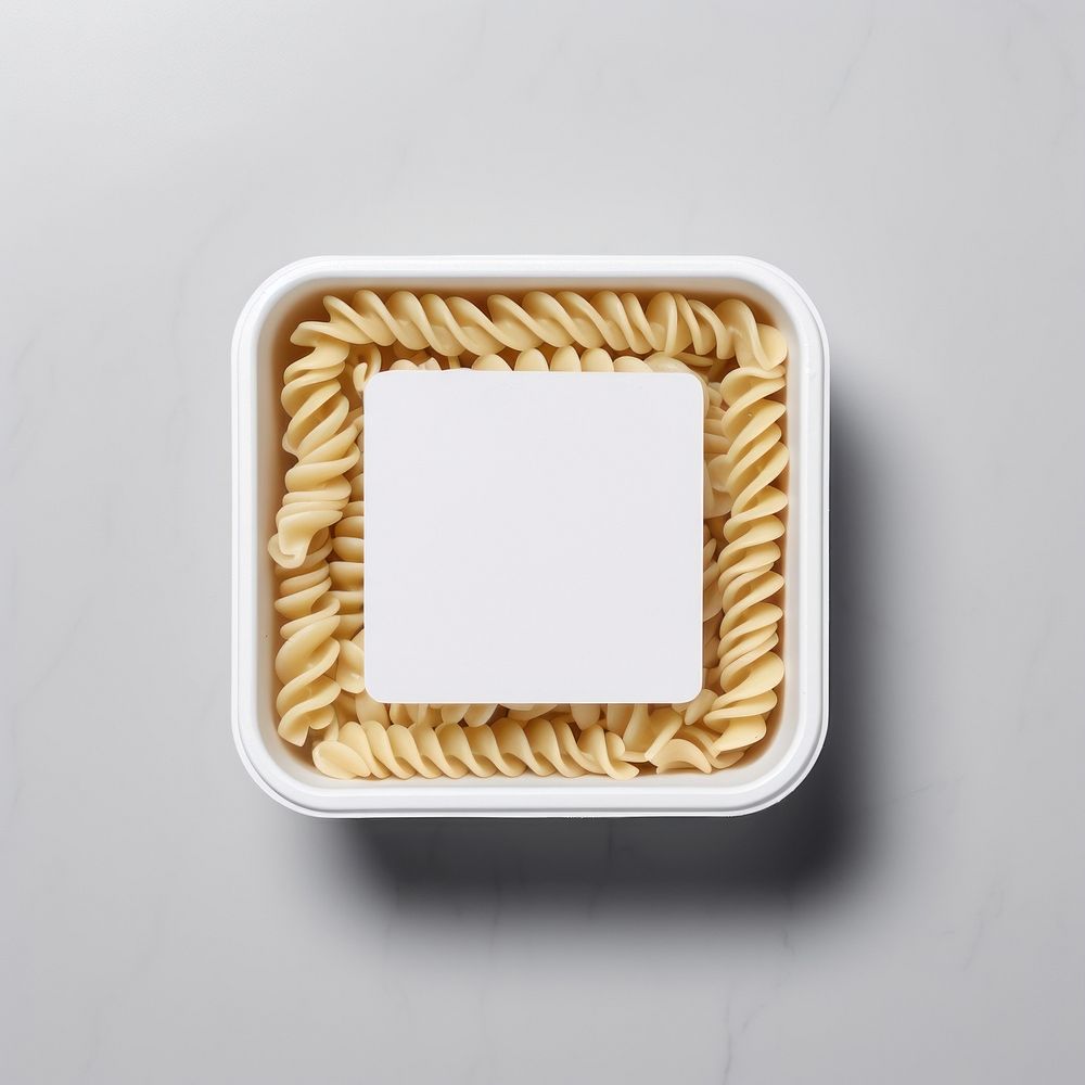 Takeaway food container box  with pasta with sauce and blank label  packaging meal dish gray background.