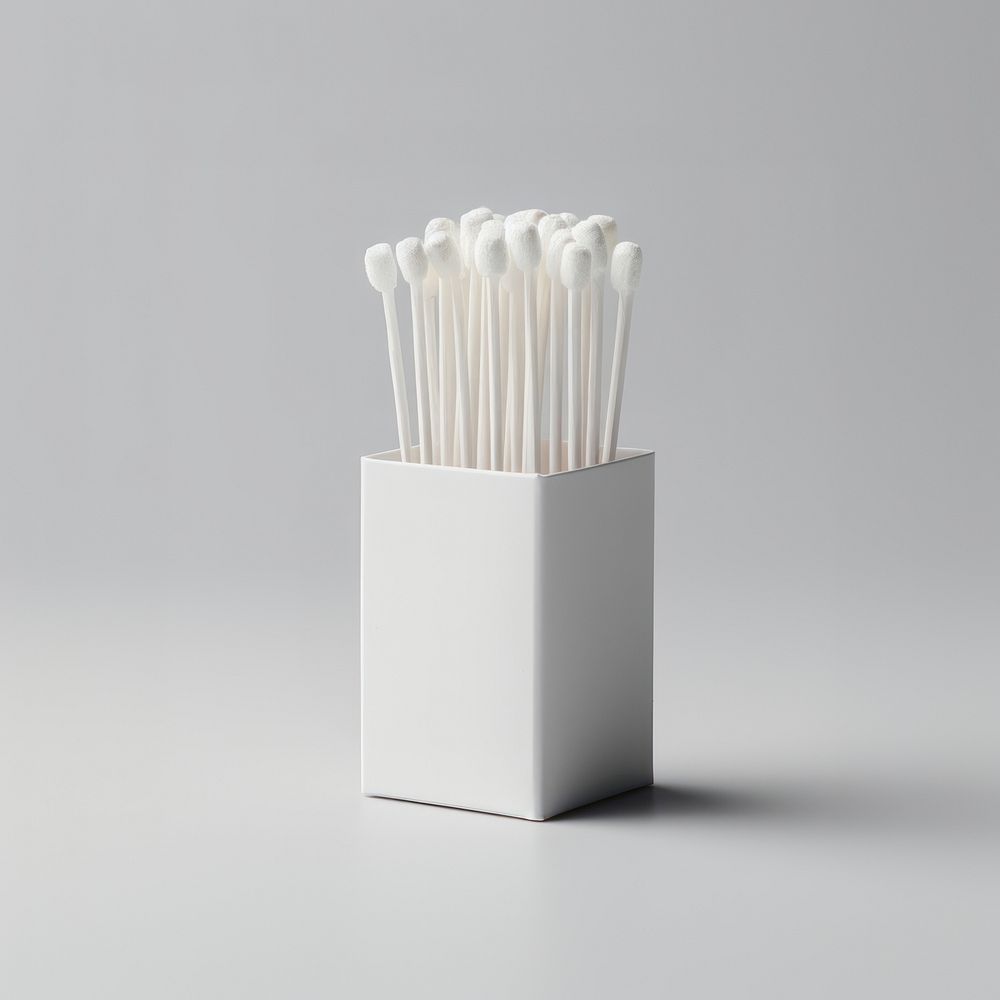 Cotton bud  packaging white gray gray background.
