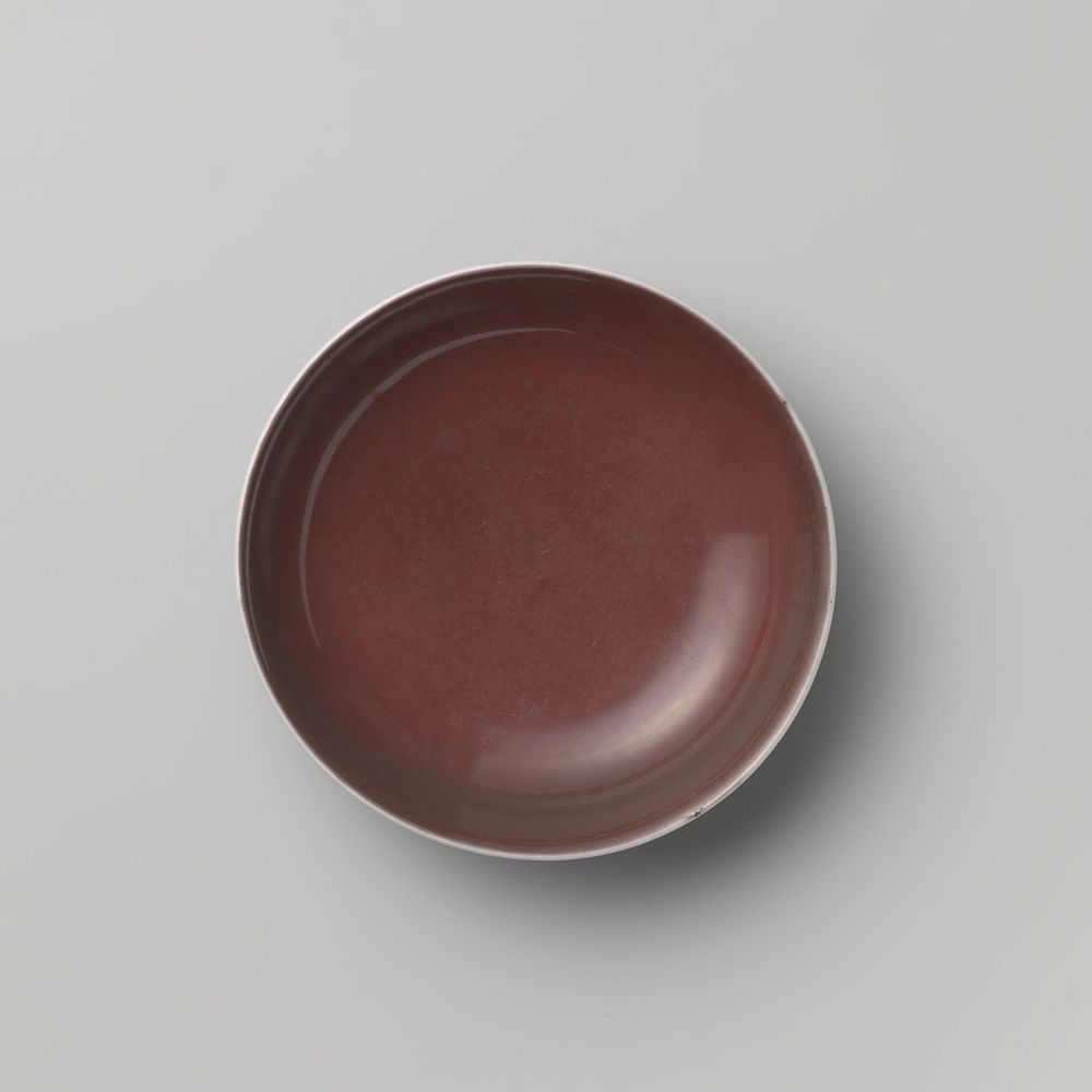 Saucer-dish with a red glaze (c. 1700 - c. 1799) by anonymous