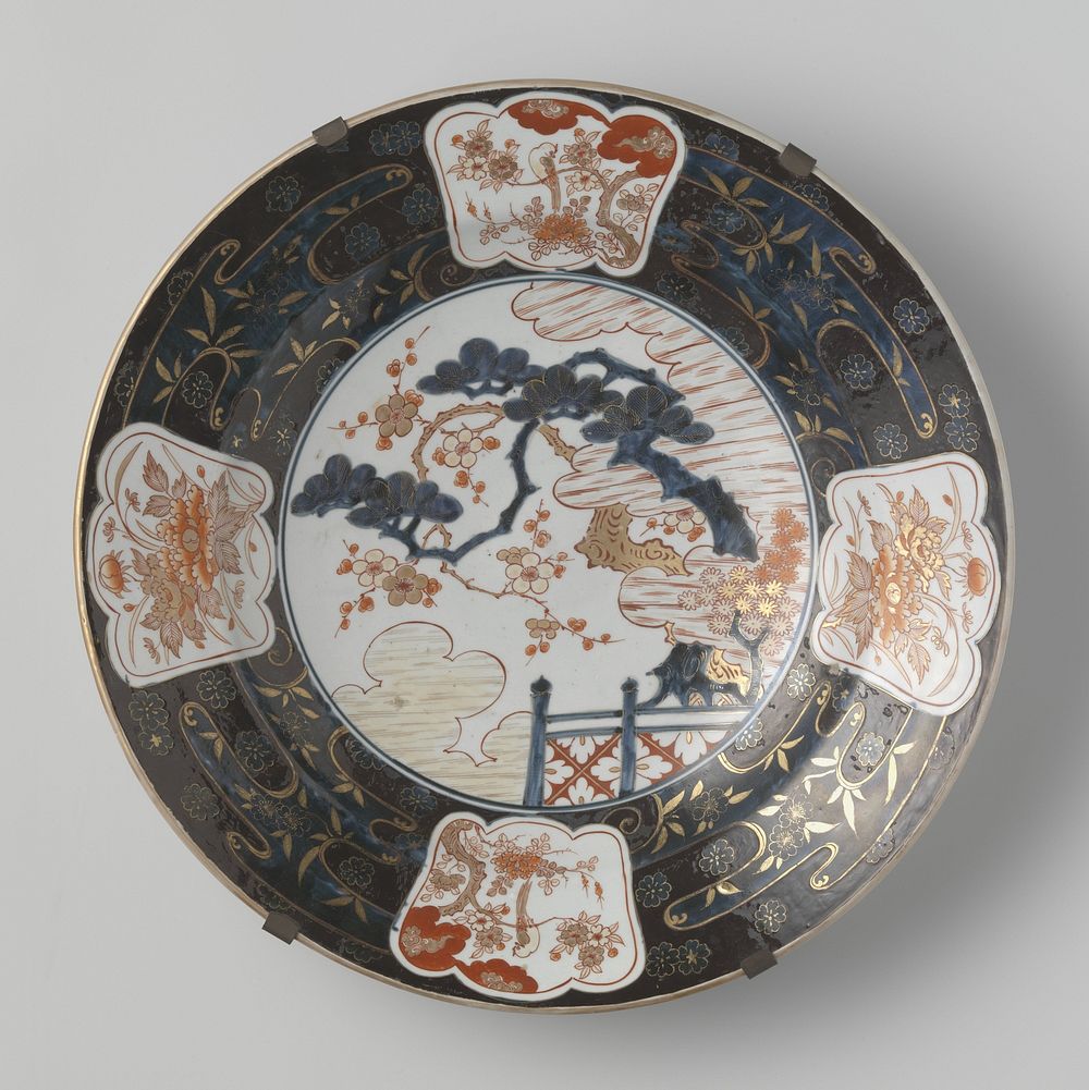 Dish with a prunus tree behind a fence and flower sprays (c. 1675 - c. 1700) by anonymous