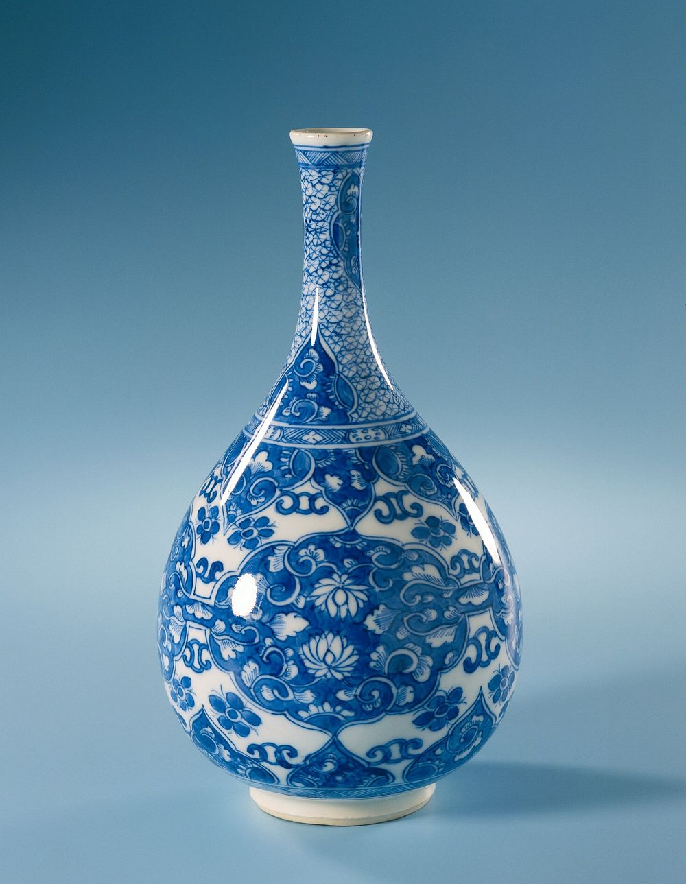 Pear-shaped bottle vase with panels with lotus scrolls (c. 1700 - c. 1724) by anonymous