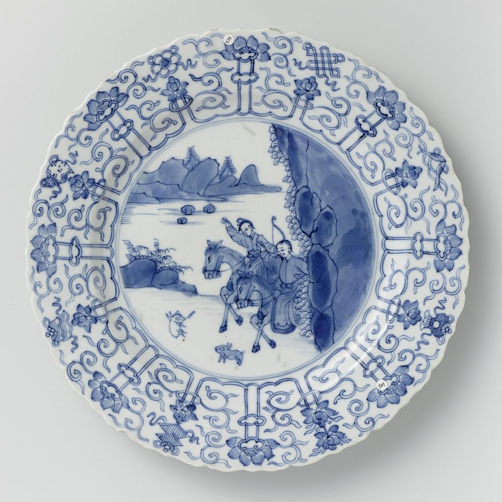 Saucer-dish with hunting scene, lotus scrolls and auspicious symbols (c. 1700 - c. 1724) by anonymous