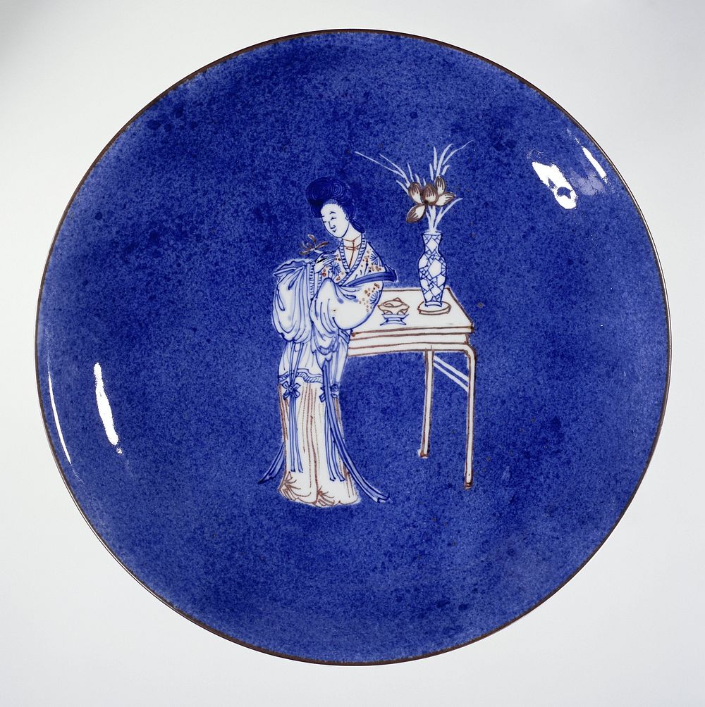 Saucer-dish with a woman on a powder blue ground (c. 1700) by anonymous