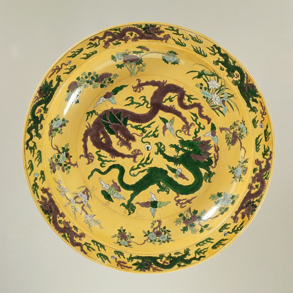 Dish with pearl chasing dragons on a yellow ground (c. 1850 - c. 1900) by anonymous