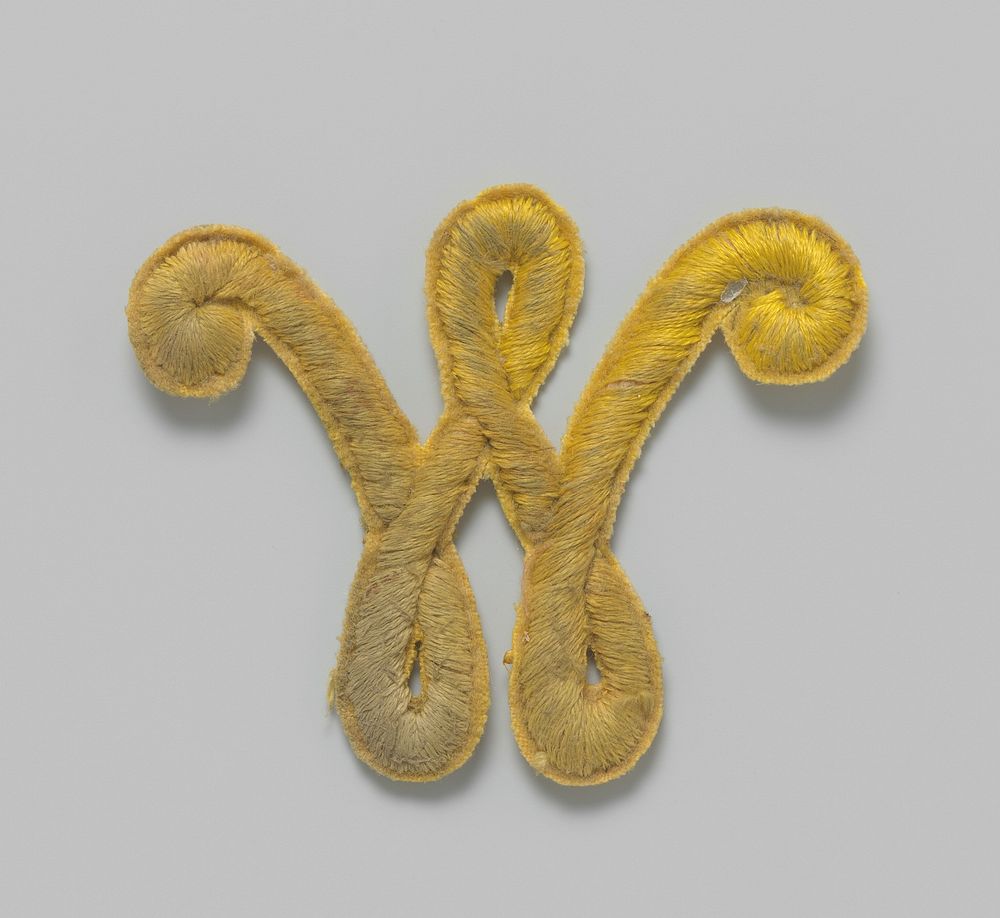 Applicatie, geborduurd in de vorm van een W in geel (c. 1850 - c. 1899) by anonymous
