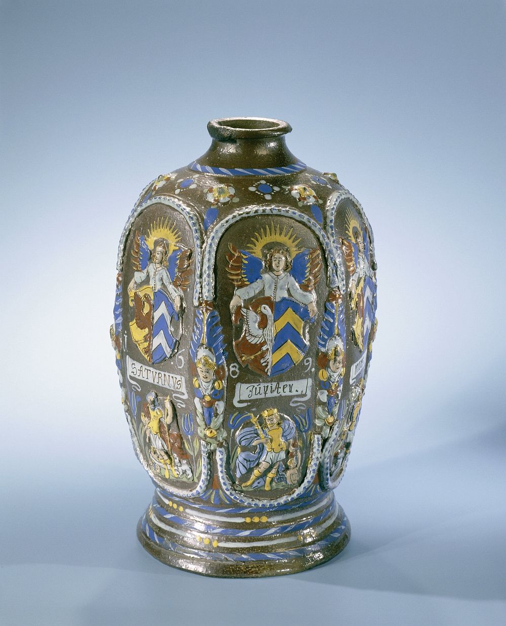 Hexagonal bottle (kruke) with the planets and a coat of arms (1689) by anonymous
