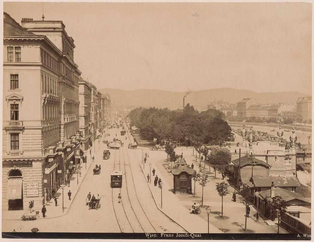Gezicht op de Frans-Josefskade in Wenen met winkels, gebouwen, trams en karren (c. 1880 - c. 1895) by A Wimmer