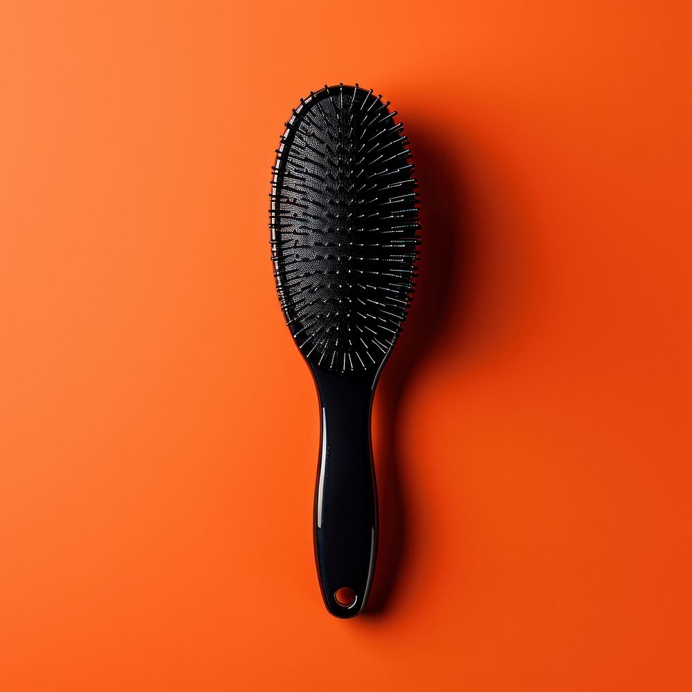 Modern hairdressing hairbrush tool device racket. AI generated Image by rawpixel.