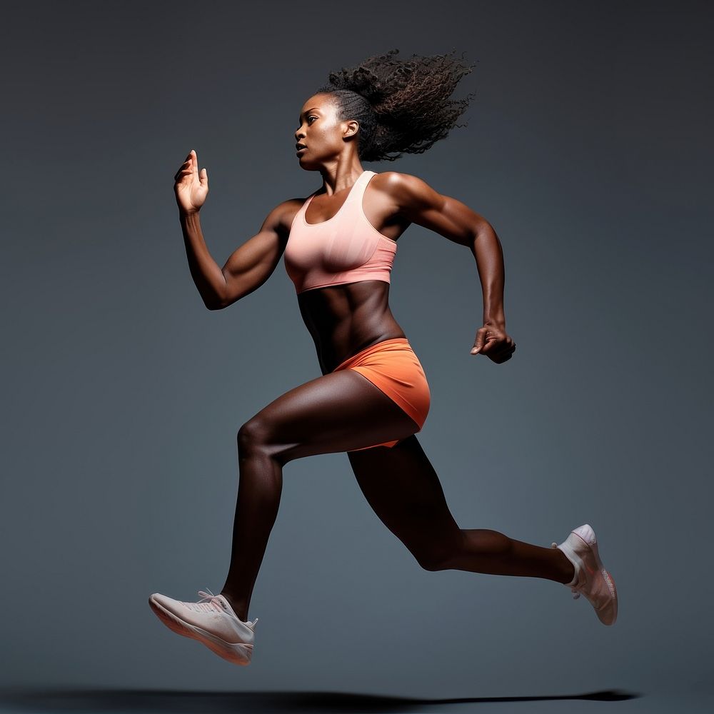 Black female athlete is running recreation dancing adult.
