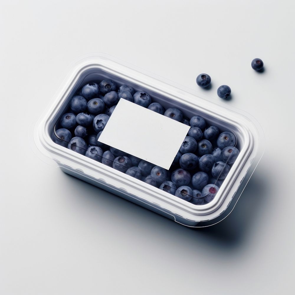 Takeaway food container box  with blueberry and blank label  packaging fruit antioxidant freshness.