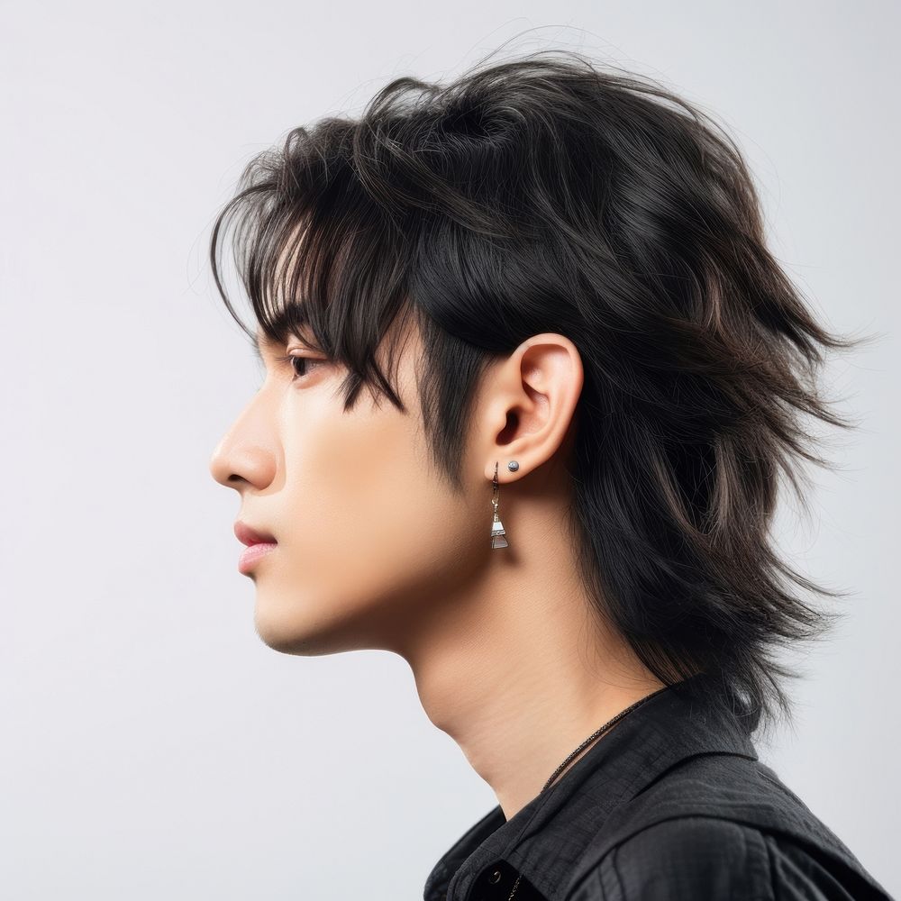 Handsome Asian young man portrait photography earring.