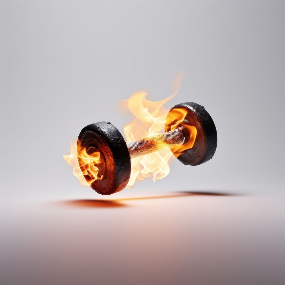 Photography of a Burning dumbell fire burning light.
