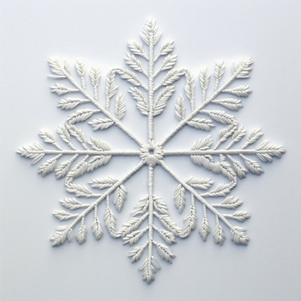 Snowflake in embroidery style white celebration accessories.