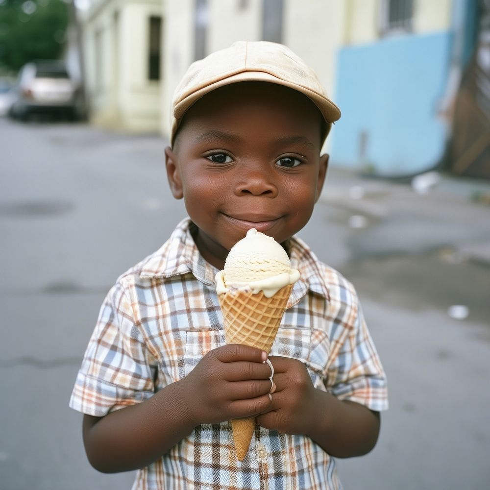 A little boy holding an ice cream cone child food kid.
