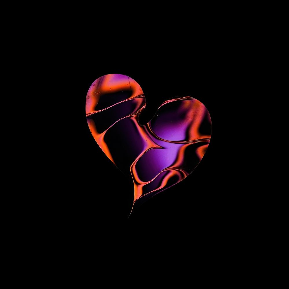 A broken heart purple black background single object.