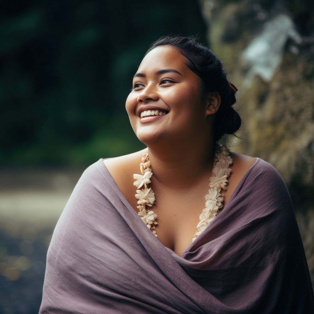 A chubby Tonga woman in happy mood laughing necklace portrait.