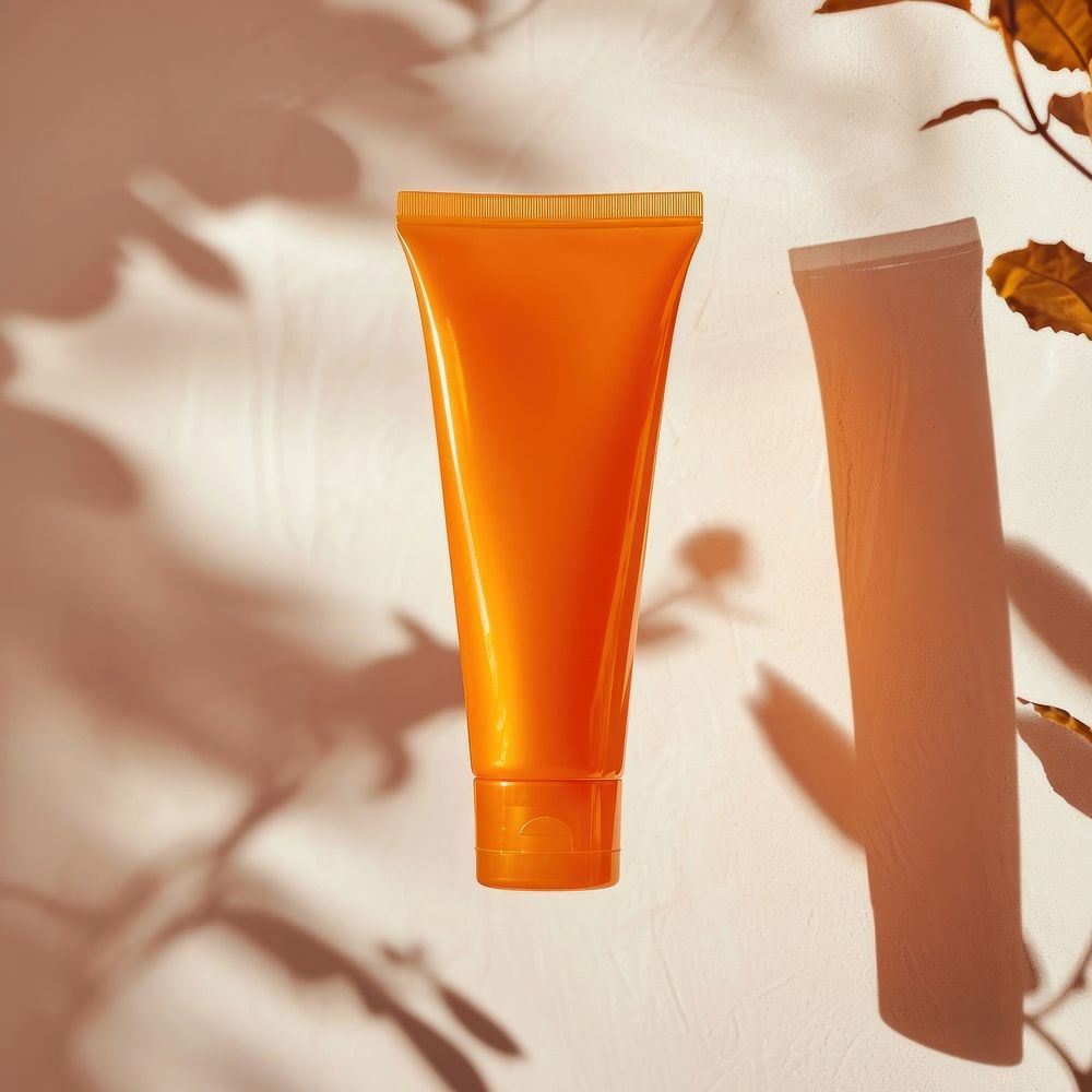 Orange clear showergel tube refreshment cosmetics sunscreen.