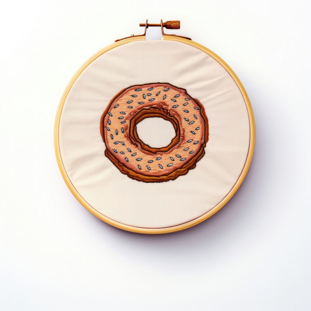 Embroidery Style Photo of a donut embroidery pattern textile.