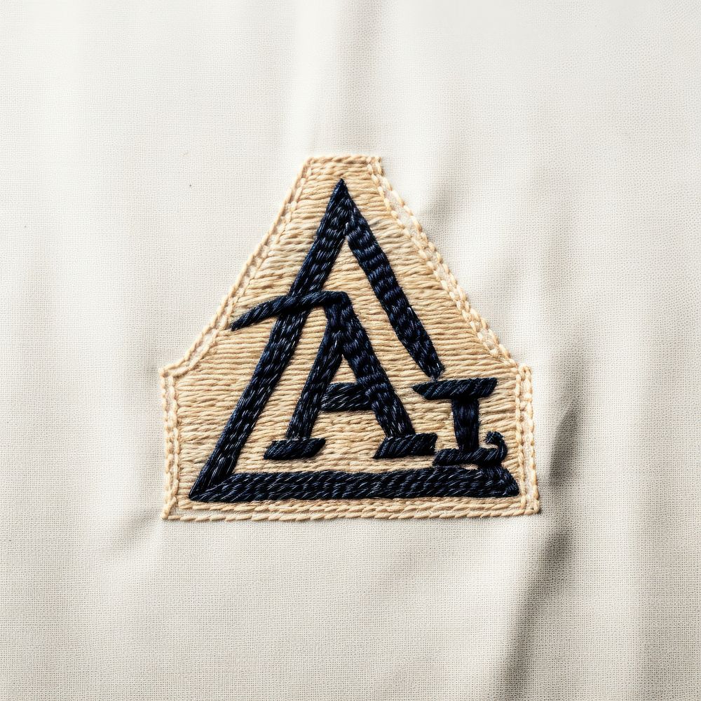 Vintage logo in embroidery style textile accessories accessory.