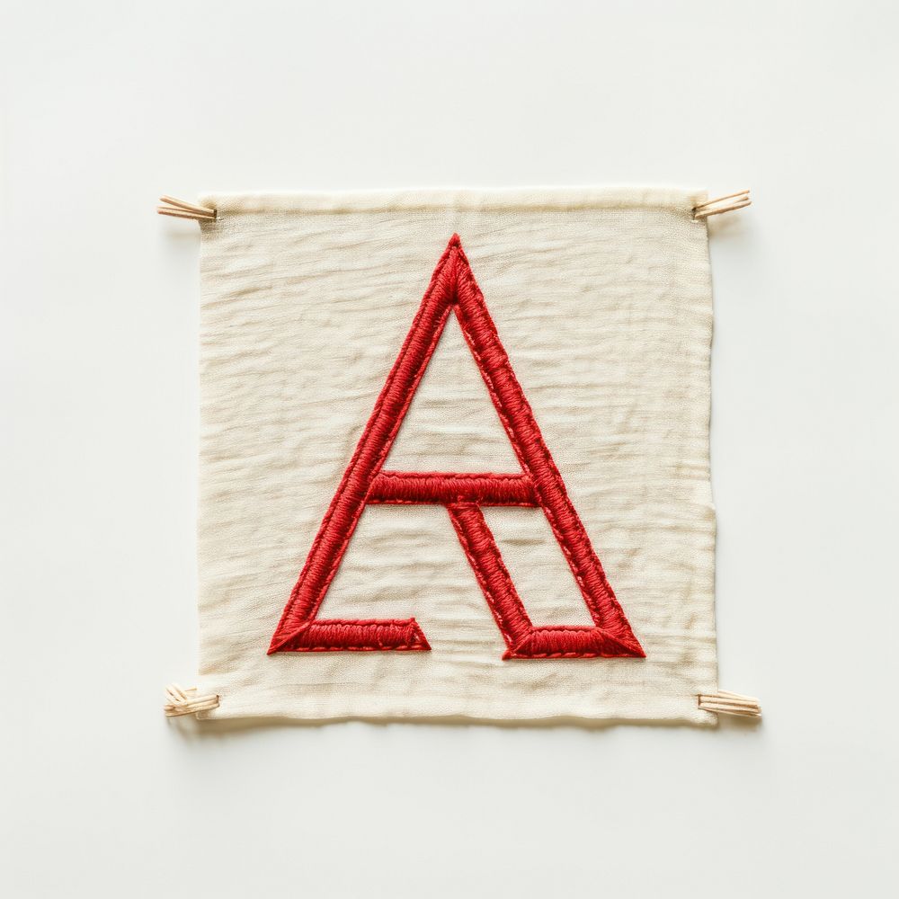 Vintage logo in embroidery style textile pattern triangle.