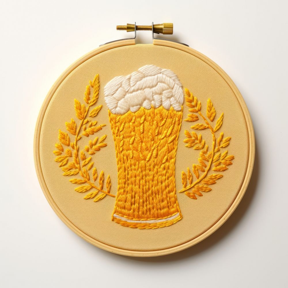 A beer in embroidery style textile gold representation.