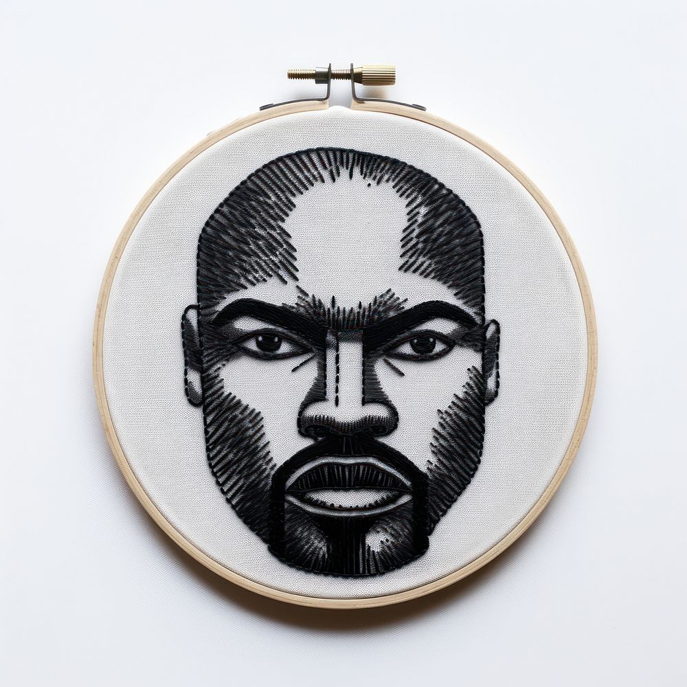 A black man head in embroidery style locket representation accessories.