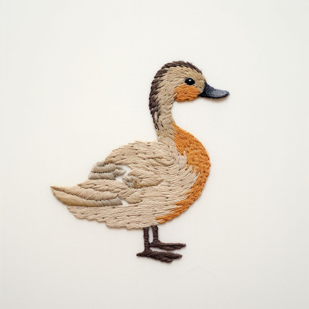 A duck in embroidery style animal bird representation.