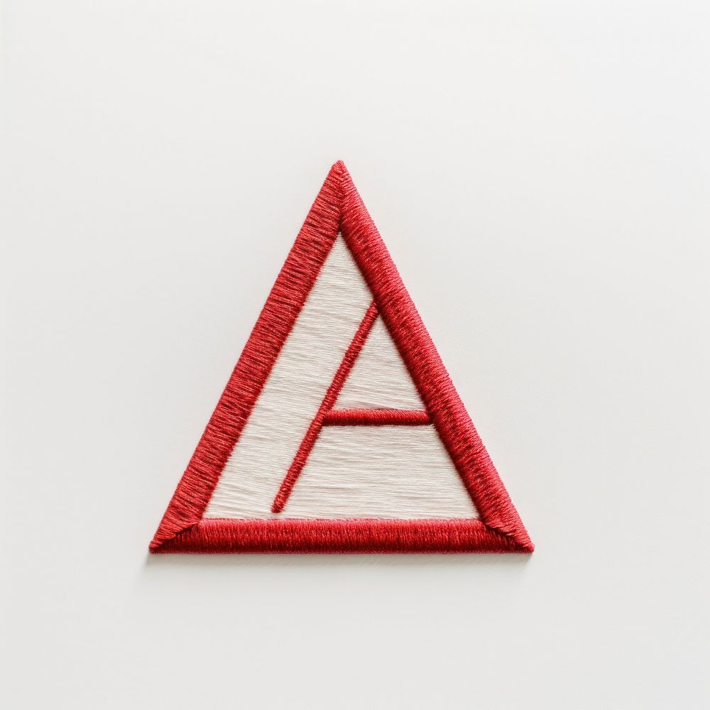 Modern logo in embroidery style textile triangle pyramid.