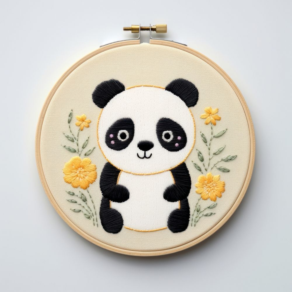 Panda in embroidery style needlework textile pattern.
