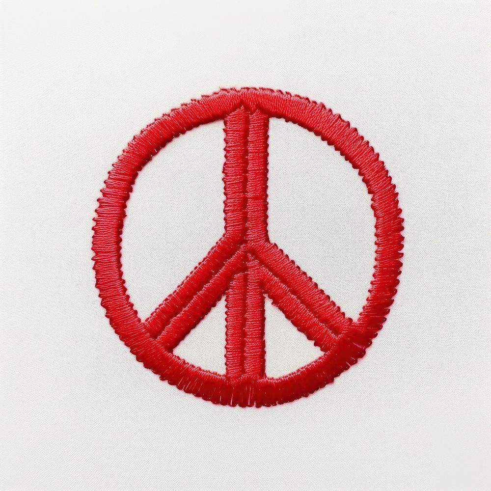 A Peace sign in embroidery style textile accessories creativity.