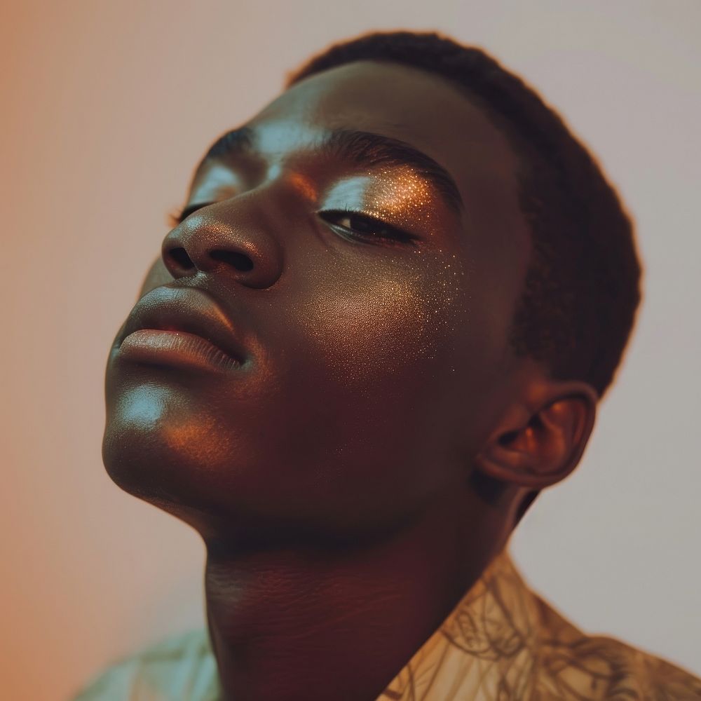 African american man teenage with makeups adult headshot portrait.