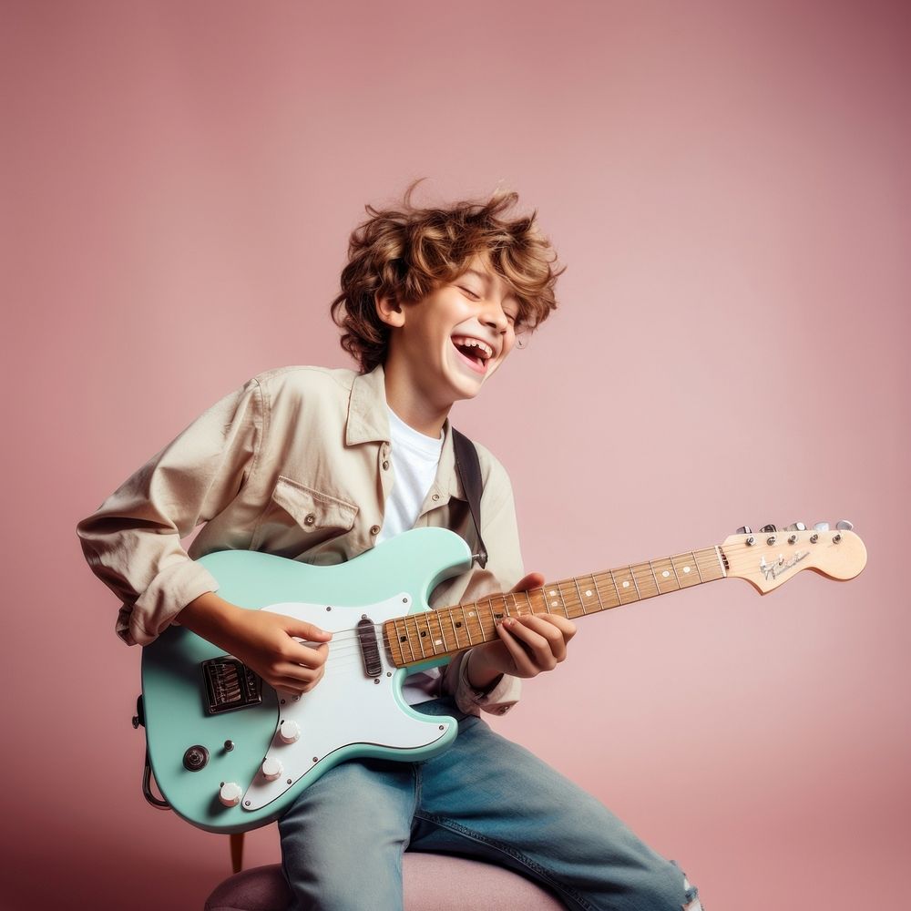 Boy play guitar musician portrait individuality. AI generated Image by rawpixel.