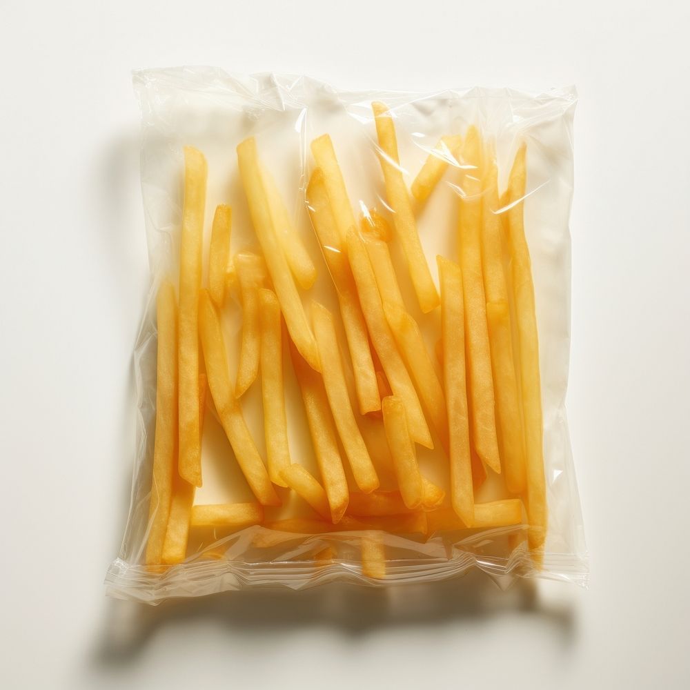 Plastic wrapping over a french fries food white background freshness.